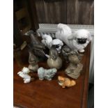 A COLLECTION OF POOLE AND OTHER CERAMIC BIRDS AND FIVE CERAMIC DOGS