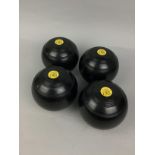 A SET OF LAWN BOWLS