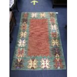 A CHINESE PATTERNED RUG