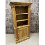 A PINE OPEN BOOKCASE