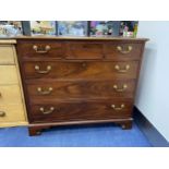 A MAHOGANY CHEST OF DRAWERS