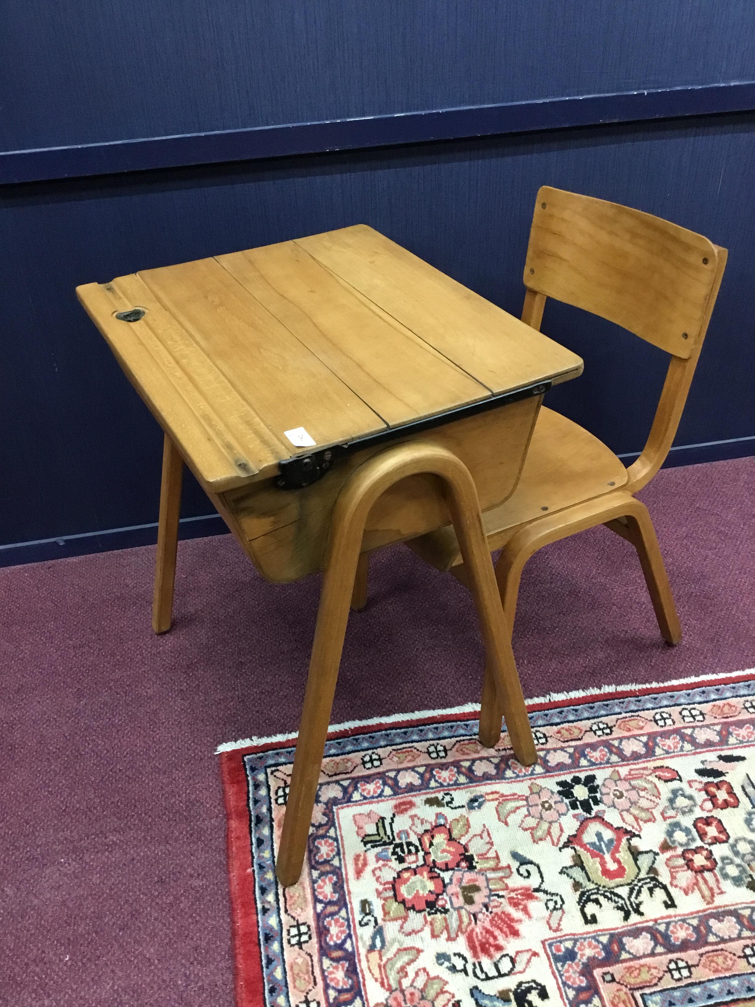 A CHILD'S SCHOOL DESK AND CHAIR