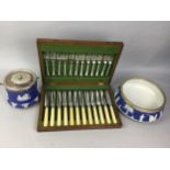 A WEDGWOOD JASPERWARE BISCUIT BARREL, BOWL AND CANTEEN