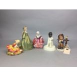 A ROYAL DOULTON FIGURE OF GOODY TWO SHOES AND TWO OTHER FIGURES
