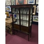 AN EDWARDIAN INLAID MAHOGANY DISPLAY CABINET