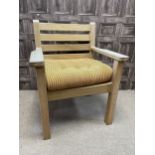 A MODERN OAK ARM CHAIR