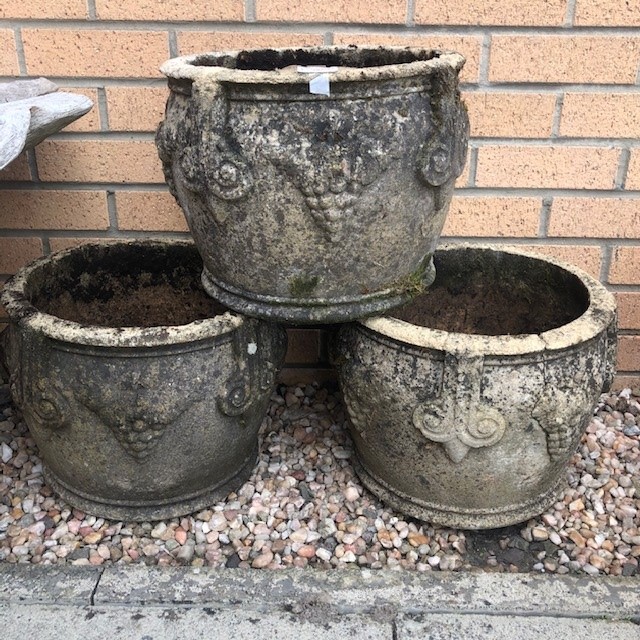 A LOT OF THREE STONE CIRCULAR PLANTERS