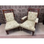 A PAIR OF LATE VICTORIAN ARMCHAIRS
