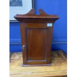 A MAHOGANY TABLE TOP CUPBOARD