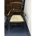 AN EARLY 20TH CENTURY INLAID MAHOGANY ELBOW CHAIR