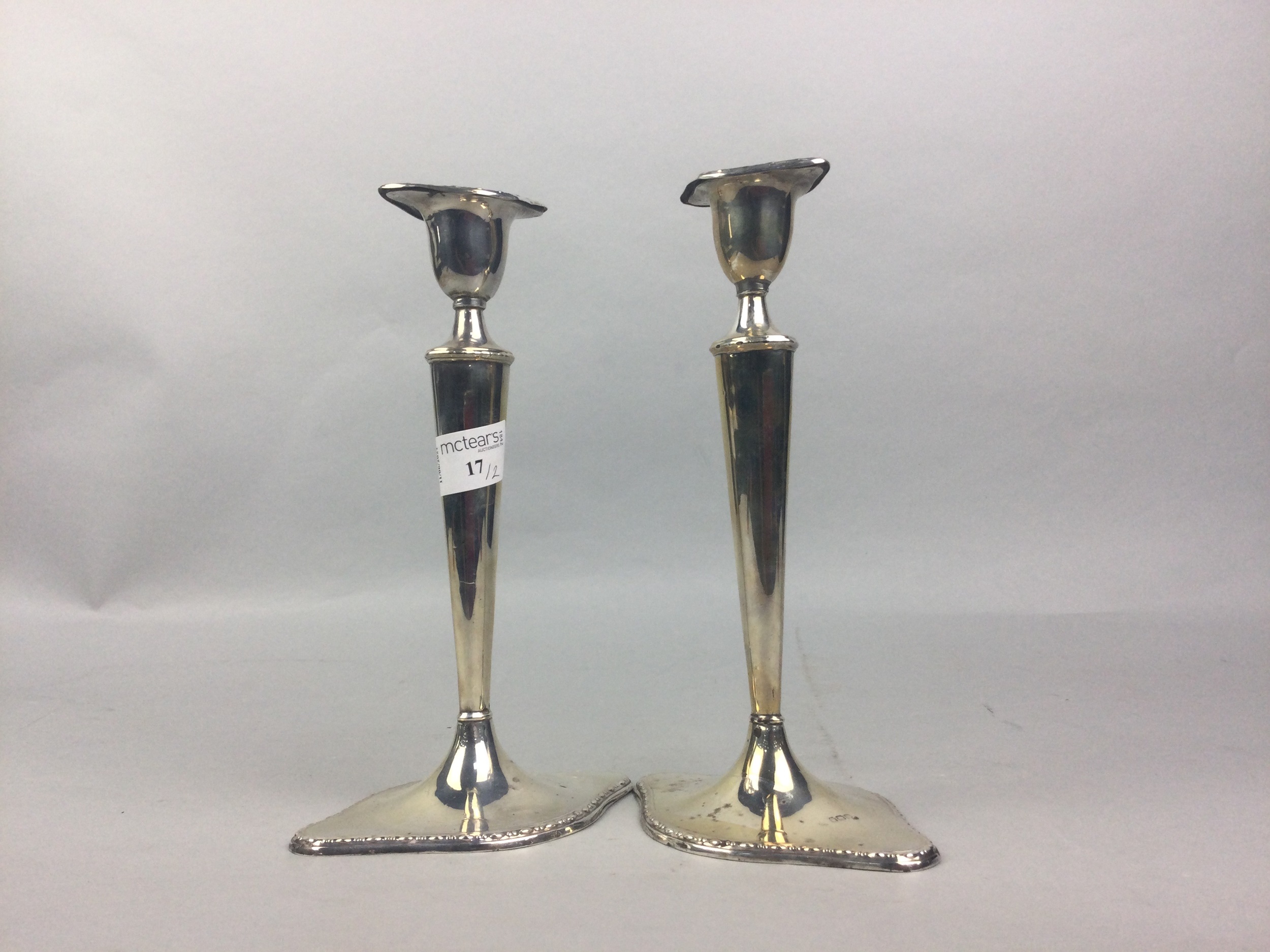 A PAIR OF SILVER CANDLESTICKS - Image 2 of 2