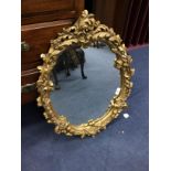 A 20TH CENTURY GILT FRAMED WALL MIRROR AND TWO OTHER MIRRORS