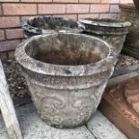 A LOT OF THREE STONE CIRCULAR PLANTERS