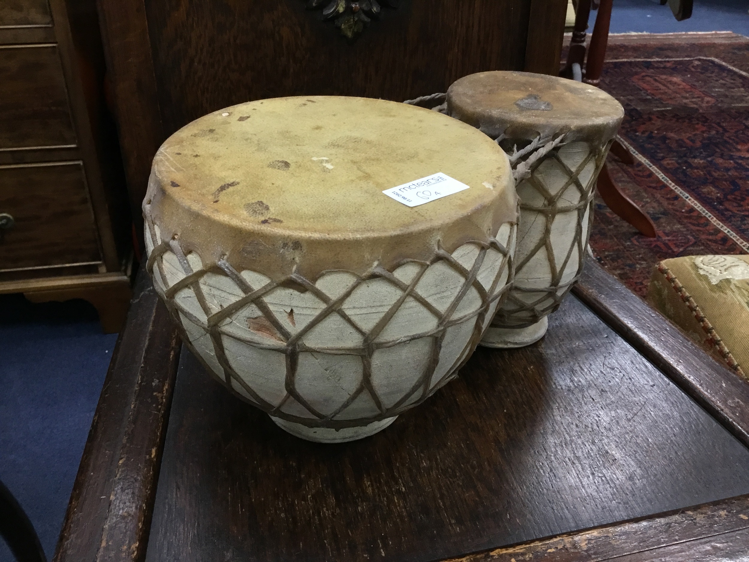 A PAIR OF AFRICAN BONGO DRUMS