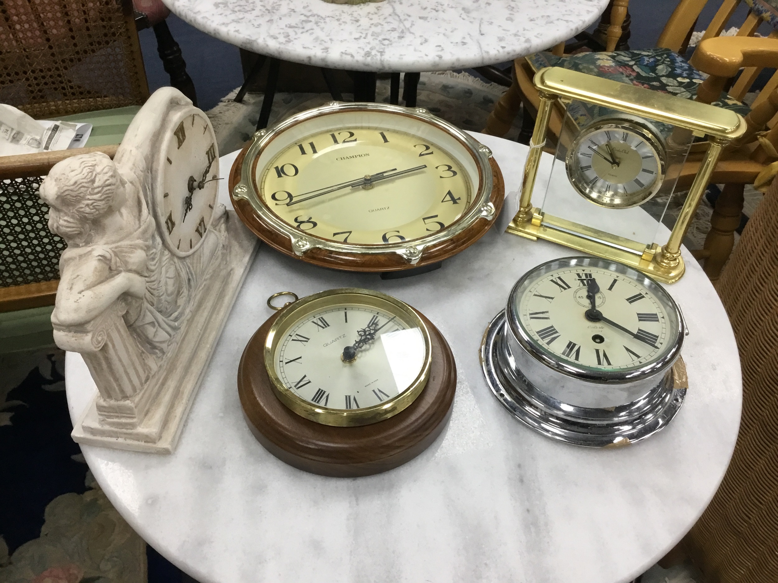 A SHIP'S BULKHEAD CLOCK AND OTHER CLOCKS