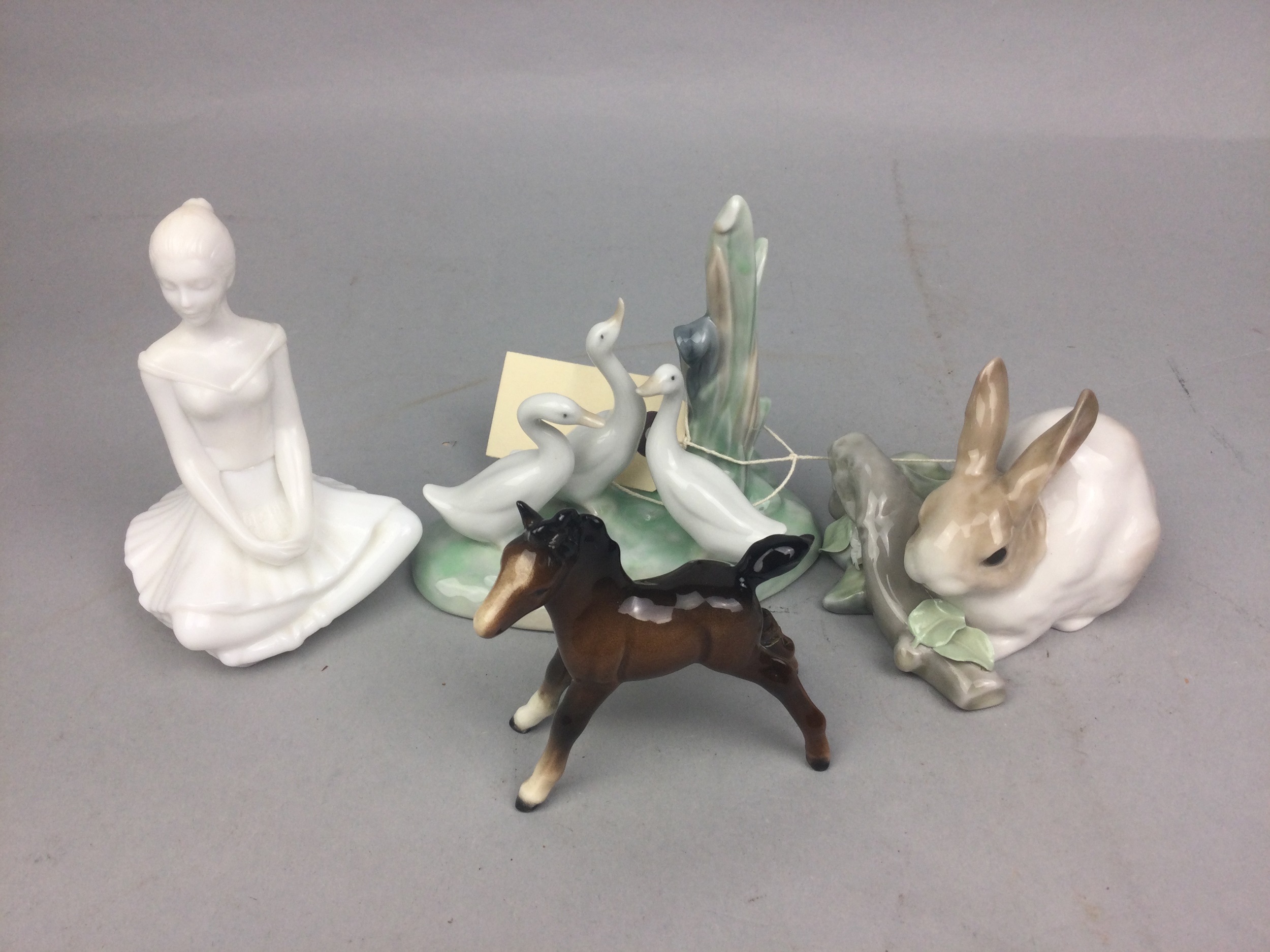 A NAO FIGURE OF GEESE, A LLADRO FIGURE AND TWO OTHER FIGURES