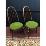 A SET OF SIX ERCOL SPINDLE BACK DINING CHAIRS