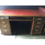 A MAHOGANY KNEEHOLE DESK