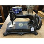 A VICTORIAN ORIGINAL 'PRINCESS' ORNATE HAND SEWING MACHINE AND FISHING ITEMS