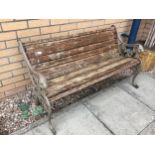 A CAST IRON ENDED GARDEN BENCH