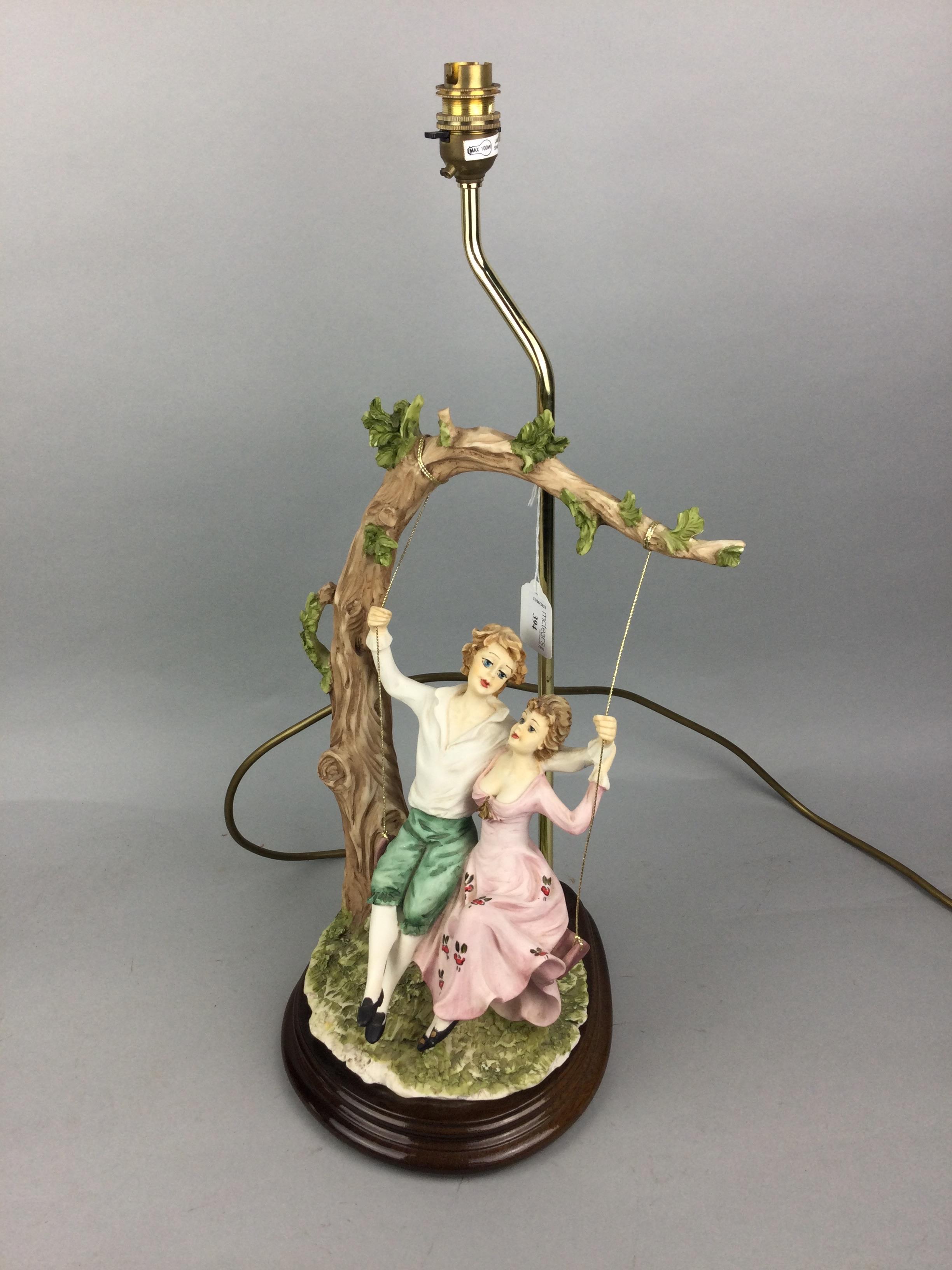 CAPODIMONTE FIGURAL TABLE LAMP, ANOTHER TABLE LAMP, A NUT DISH AND A FIGURE OF A DOG