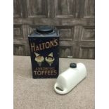 A STONEWARE HOT WATER BOTTLE AND A VINTAGE HALTON'S TIN