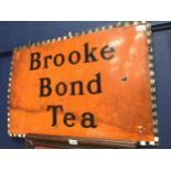 A VINTAGE BROOKE BOND TEA ENAMELLED METAL ADVERTISEMENT SIGN