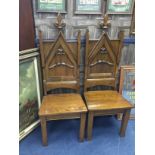 A PAIR OF EARLY 20TH CENTURY OAK HALL CHAIRS