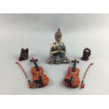 A LOT OF VARIOUS BUDDHA FIGURES AND TWO MINIATURE VIOLINS