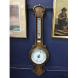 A VICTORIAN WHEEL BAROMETER AND THERMOMETER