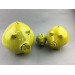 A GRADUATED SET OF THREE PIG COIN BANKS AND OTHER ITEMS