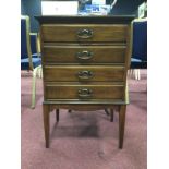 A N EDWARDIAN MAHOGANY MUSIC CABINET