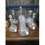 A LOT OF CRYSTAL AND GLASS DECANTERS