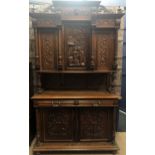 A LATE 19TH CENTURY BLACK FOREST OAK SIDEBOARD