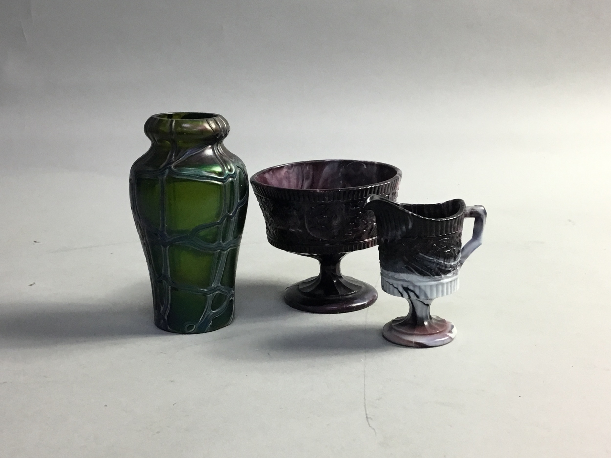 A GLASS VASE IN THE MANNER OF LOETZ, ALONG WITH A MARBLE GLASS CREAM JUG AND SUGAR BOWL