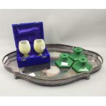 A PAIR OF ONYX GOBLETS, THREE HARDSTONE CANDLESTICKS AND A TRAY