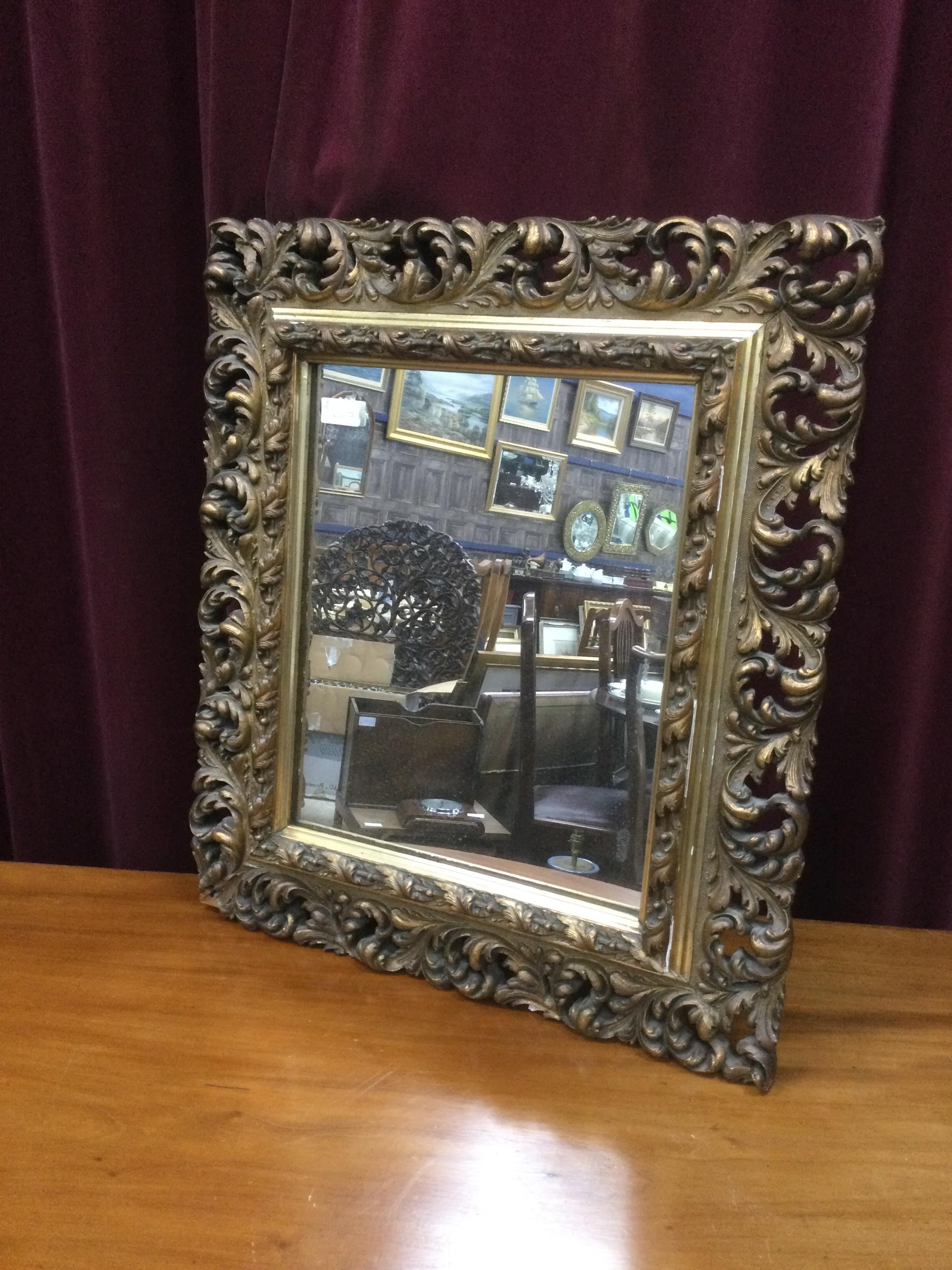 A RECTANGULAR WALL MIRROR AND SIX OTHER MIRRORS