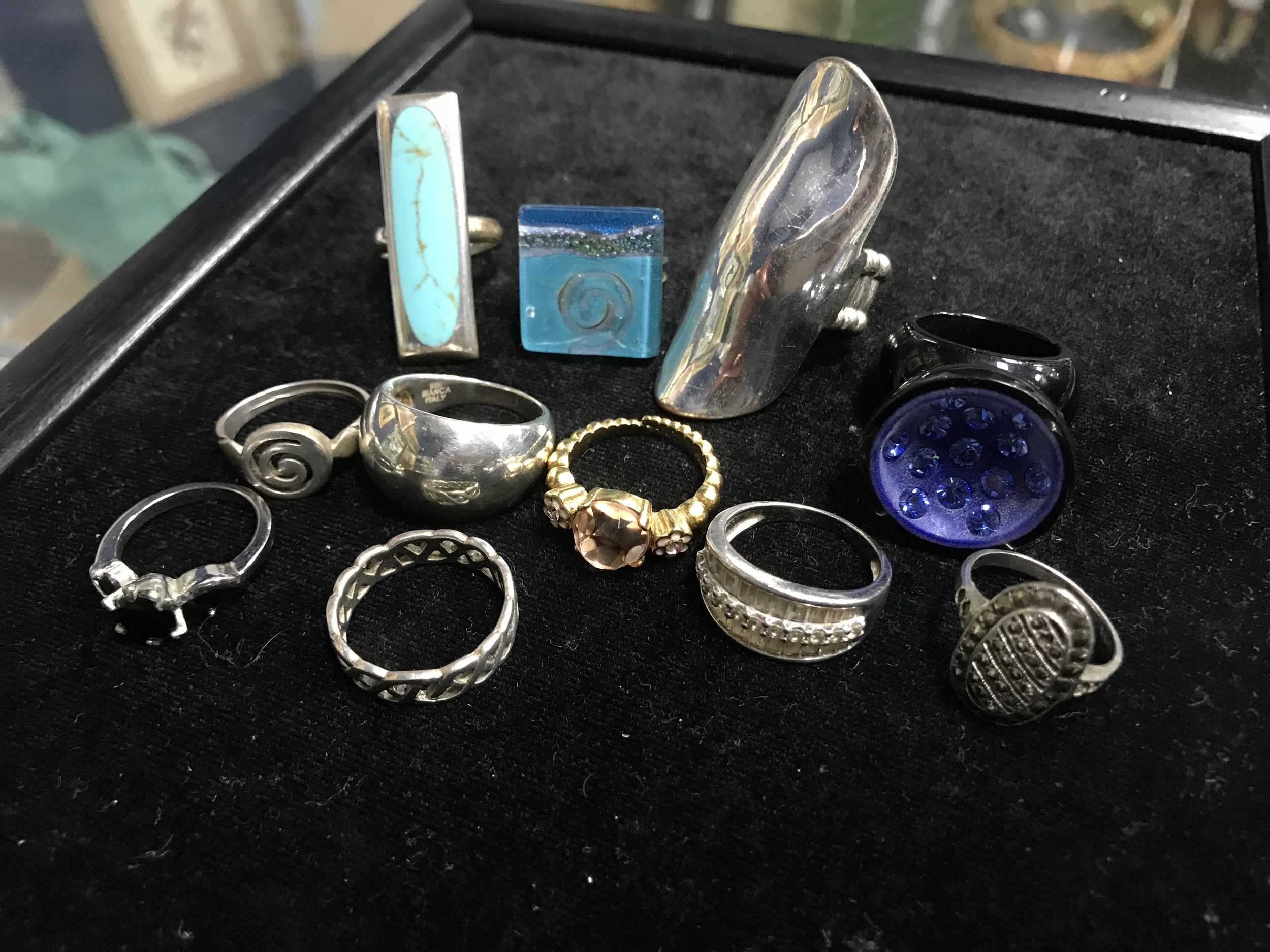 A GROUP OF ELEVEN SILVER AND OTHER DRESS RINGS