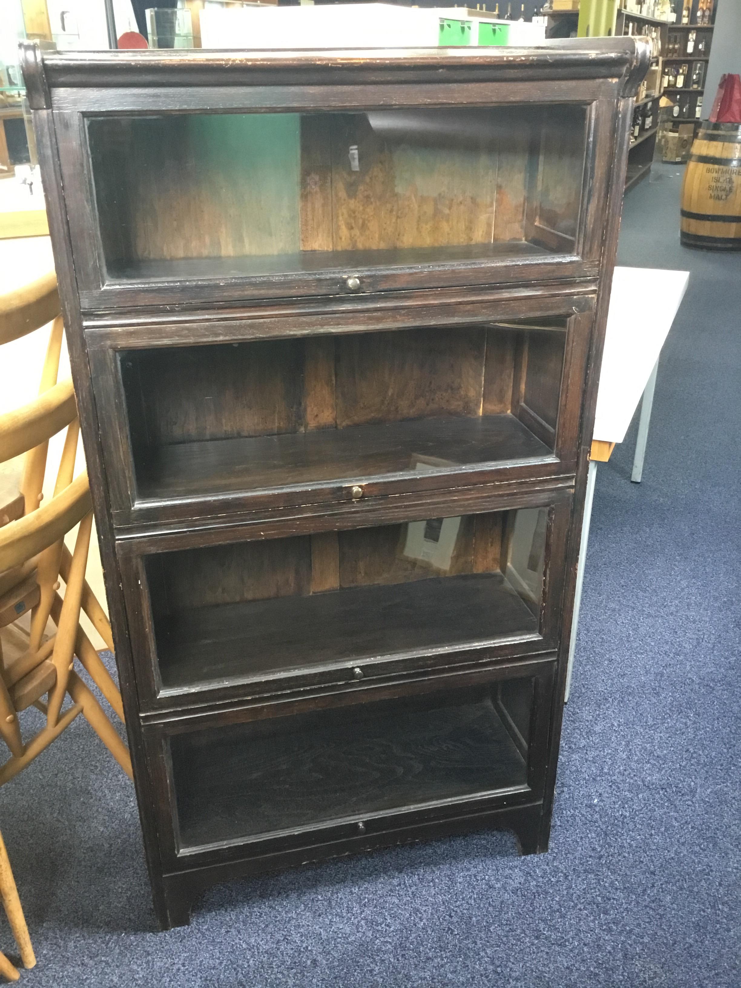 AN OAK SECTIONAL BOOKCASE