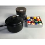 A BOXED SET OF POOL BALLS, ALONG WITH A POT AND POT STAND