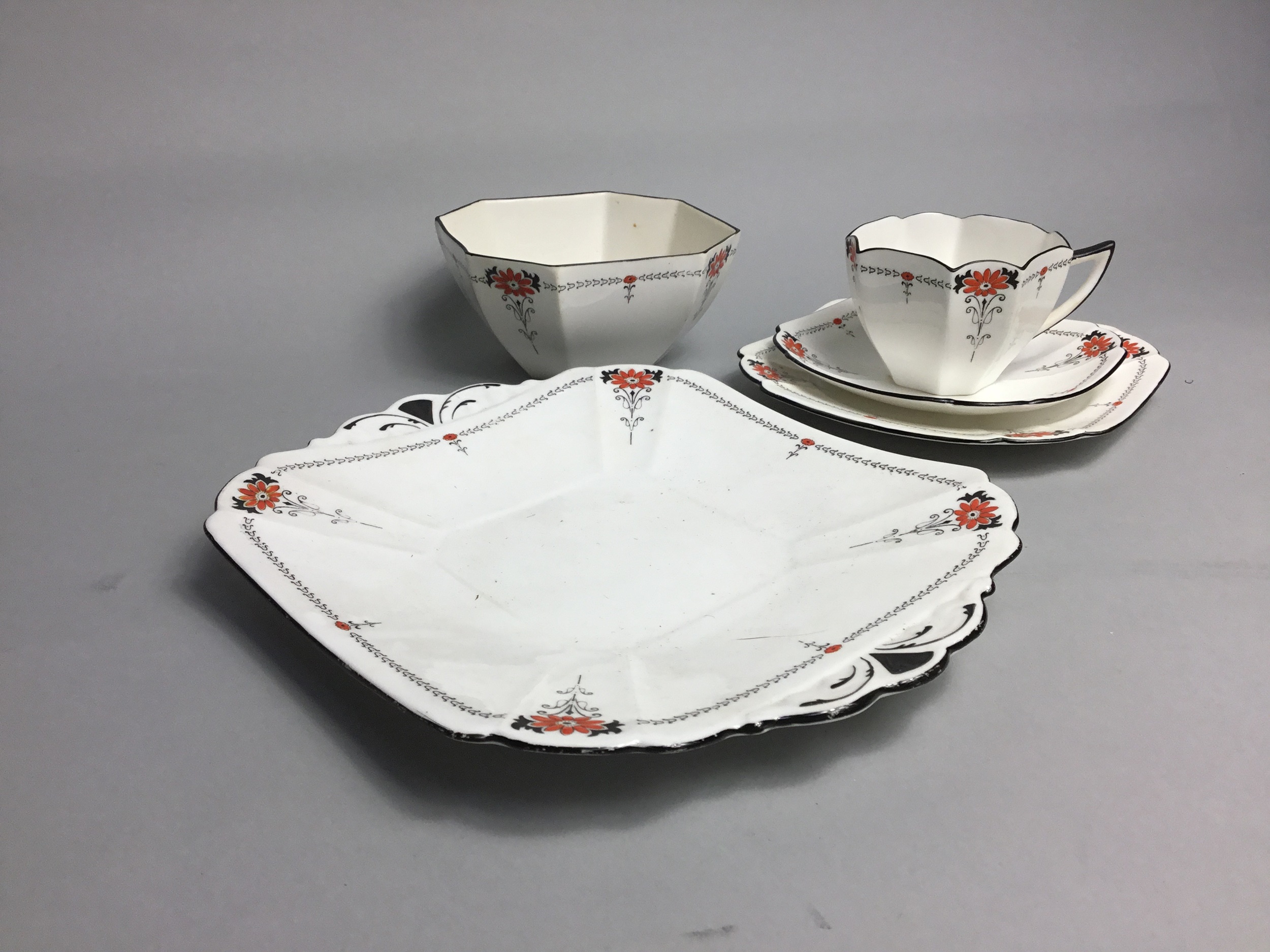 A SHELLEY PART TEA SERVICE AND A COALPORT PART TEA SERVICE IN FITTED BOX