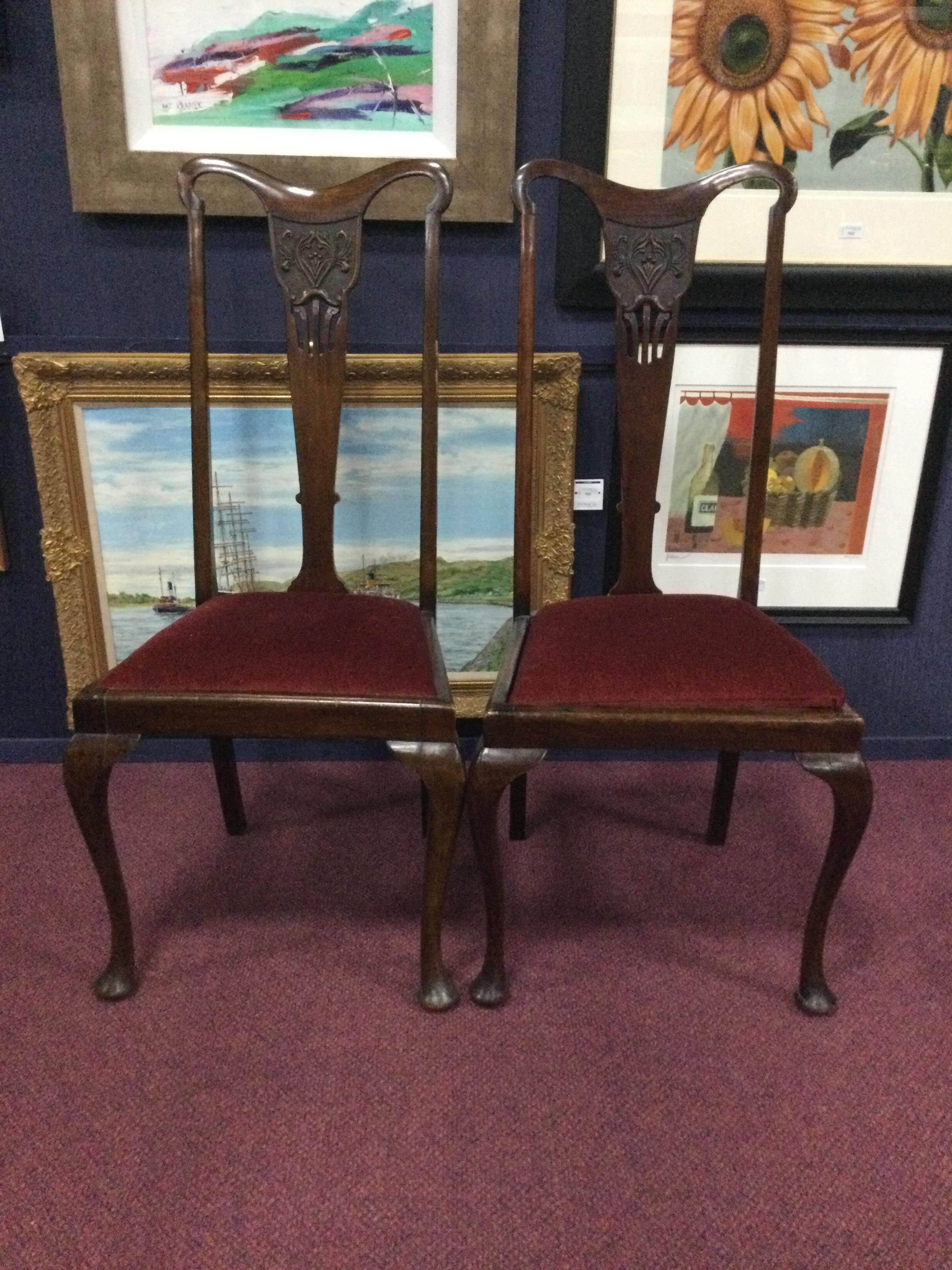 A SET OF FOUR MAHOGANY DINING CHAIRS