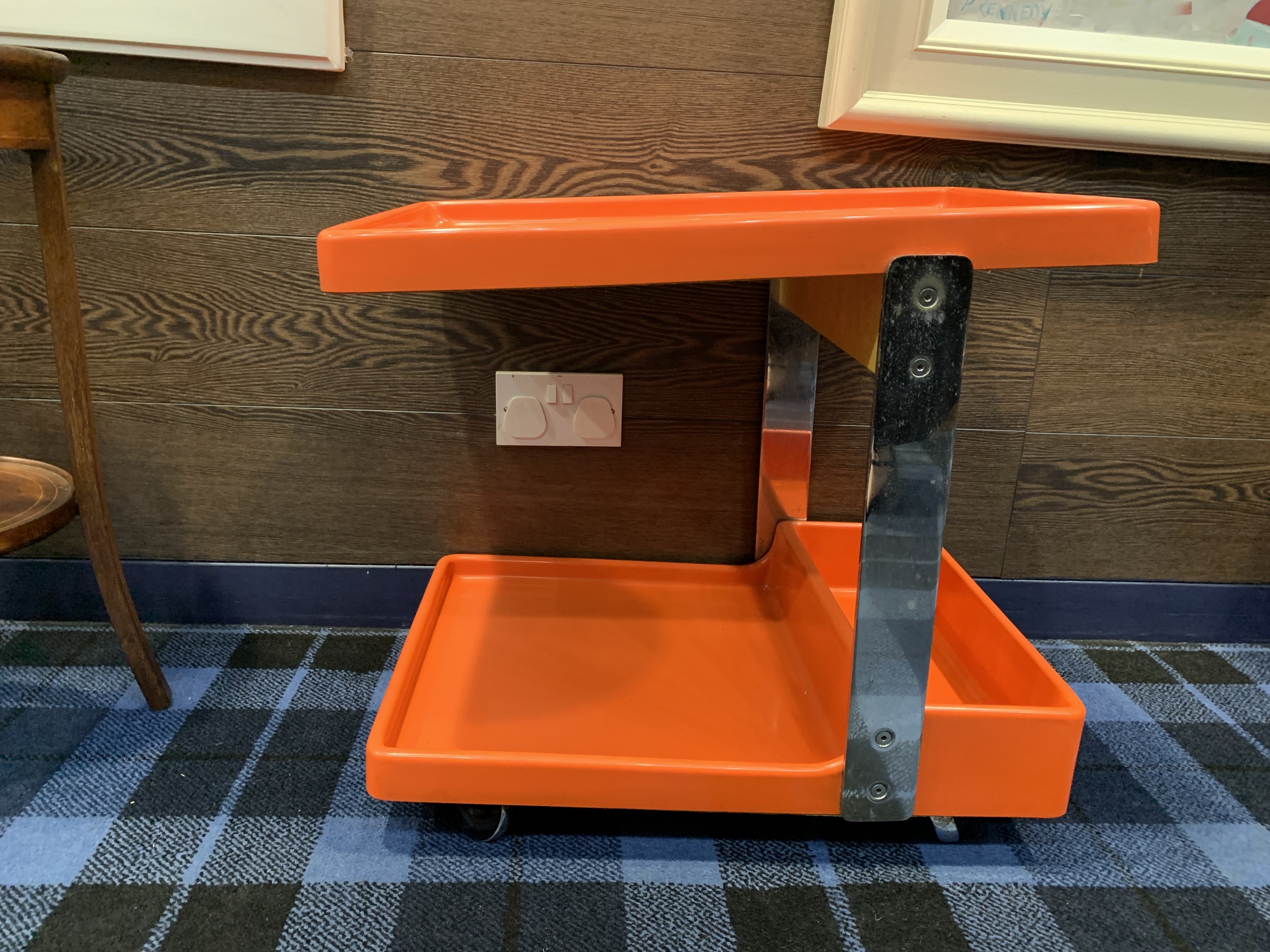 A RETRO ORANGE TROLLEY