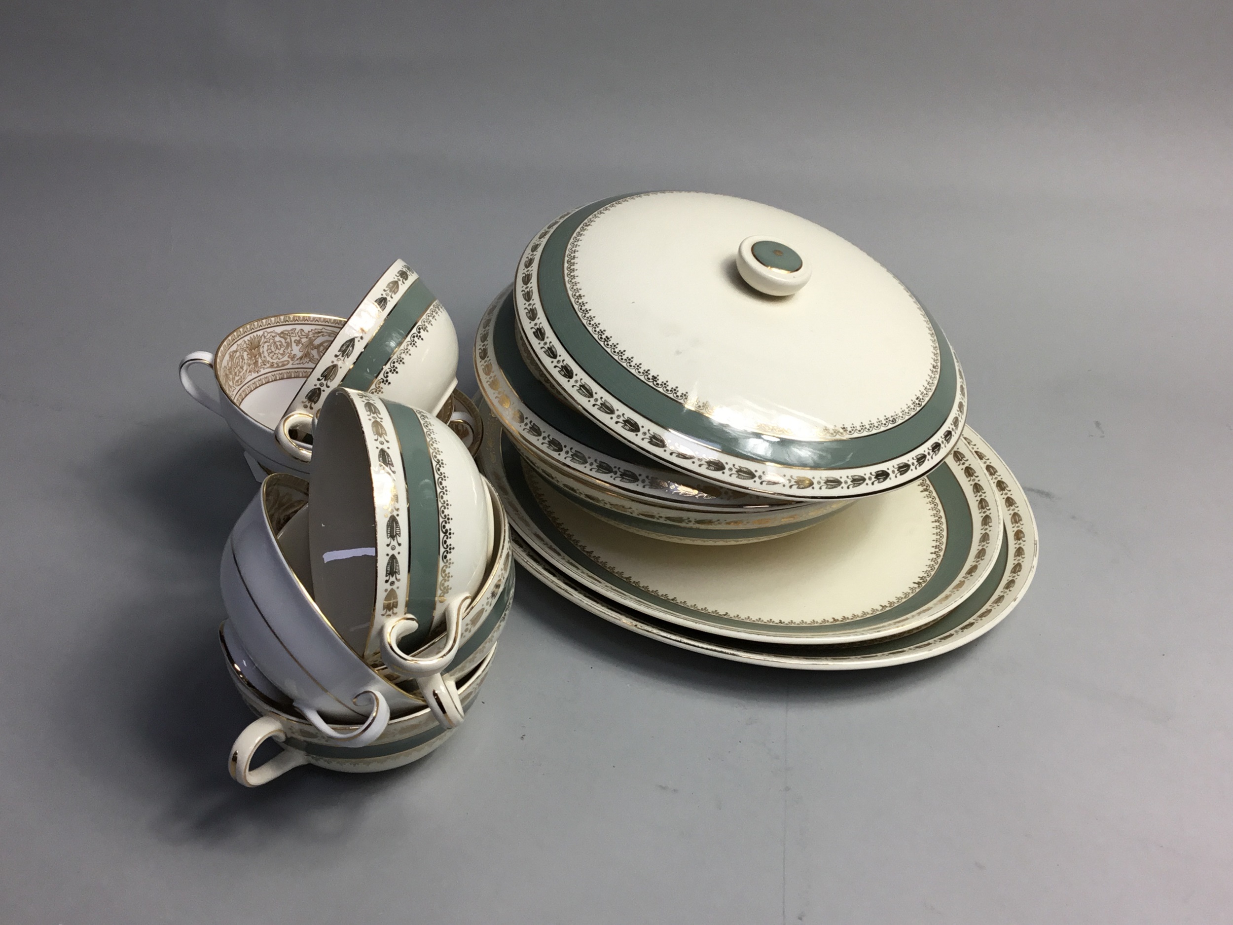 A CROWN DUCAL PART DINNER SERVICE AND A ROYAL DOULTON PART DINNER SERVICE