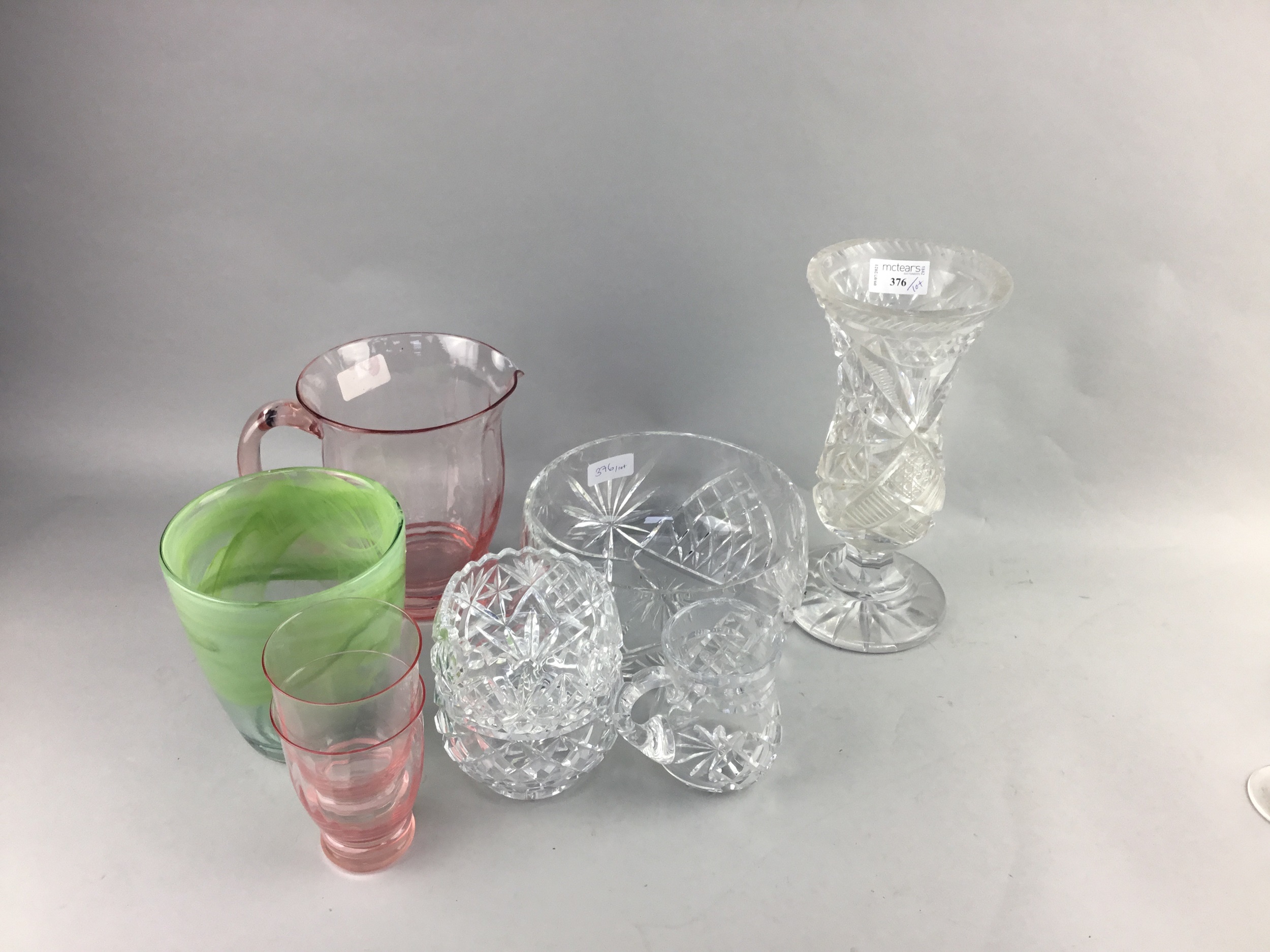 A CRYSTAL VASE AND OTHER CRYSTAL AND GLASS WARE