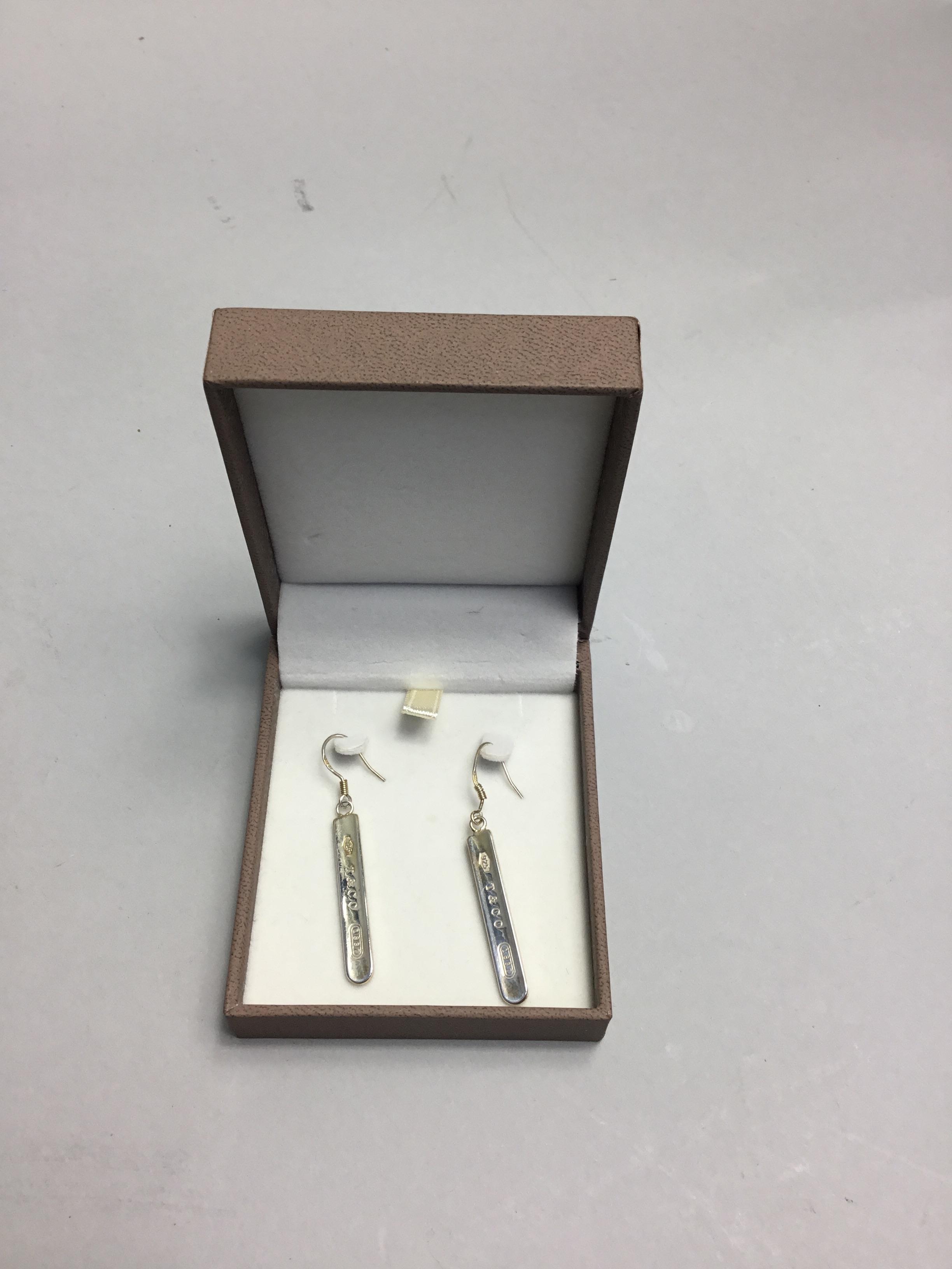 A PAIR OF TIFFANY SILVER EARRINGS