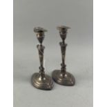 A PAIR OF EARLY 20TH CENTURY SILVER CANDLESTICKS