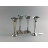 A PAIR OF SILVER SOLIFLEUR VASES AND A PAIR OF CANDLESTICKS