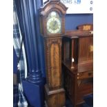 A MAHOGANY GRANDMOTHER CLOCK