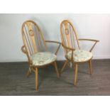 A SET OF FOUR ERCOL SWAN BACK DINING CHAIRS